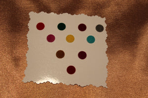 Bindis are coloured dots worn on the centre of a woman's forehead, they come in various designs and shapes.   A card of bindis come in different colours and are reusable. To reuse the adhesive after it is worn off, we recommend the use of eyelash glue for application.     ***KINDLY NOTE THAT COLOURS MAY VARY FROM PICTURE***